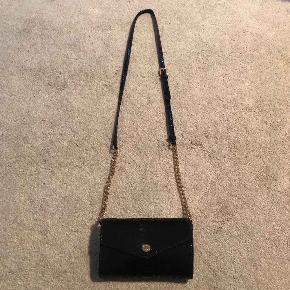 Micheal Kors black purse (Never been used)
